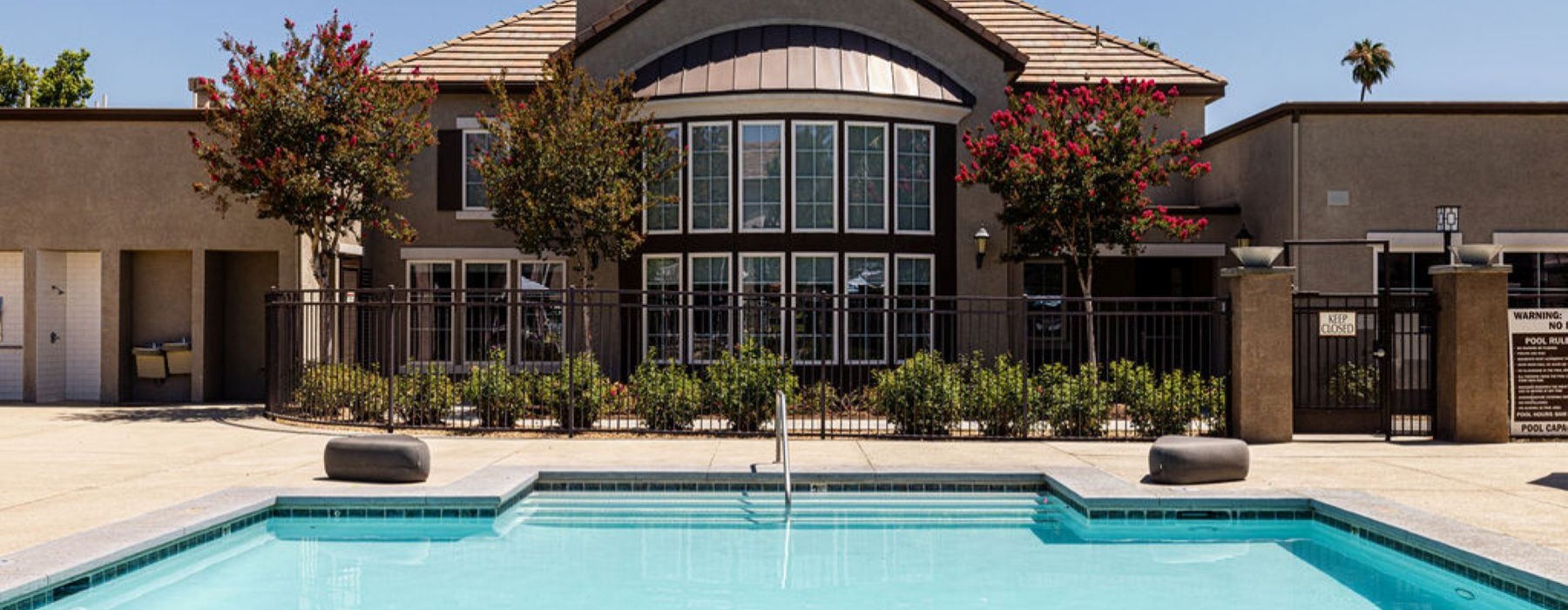 a large building with a swimming pool