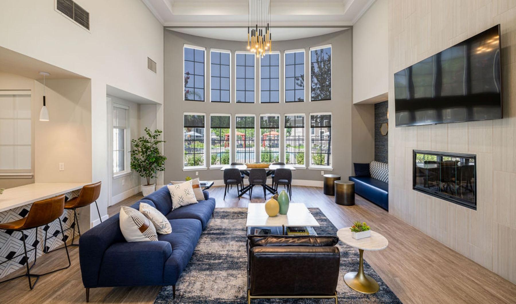 a clubroom with a tv and a couch